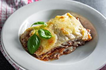 lasagna dish bechamel sauce, minced meat, grated cheese meal food snack on the table copy space food background rustic top view