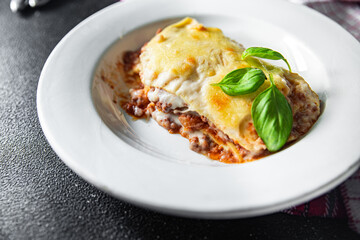 lasagna dish bechamel sauce, minced meat, grated cheese meal food snack on the table copy space food background rustic top view