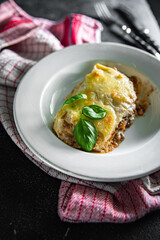 lasagna dish bechamel sauce, minced meat, grated cheese meal food snack on the table copy space food background rustic top view
