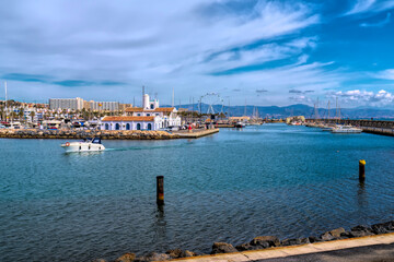 Fototapeta na wymiar Benalmadena marina Spain outer harbour with boats and yachts Spain, Costa Del Sol