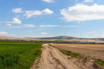 Fototapeta na wymiar landscape with road and blue sky