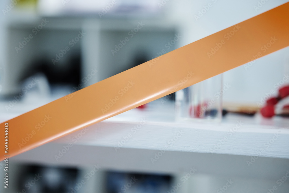 Poster you cant pass this point. shot of tape surrounding a scene at a lab.