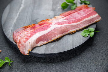 bacon slice strips fresh meat  food snack on the table copy space food background rustic top view