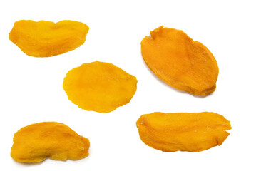 Dry tasty mango slices isolated on a white background.