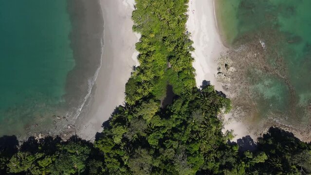 Slow drone shot hovering over Manuel Antonio beach, Costa Rica