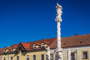 Fototapeta na wymiar Historical Marian Column in Orth an der Donau town in Austrian state of Lower Austria