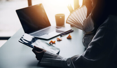 Financial Business team present. Business man hands hold documents with financial statistic stock photo, discussion, and analysis report data the charts and graphs. Finance Financial concept