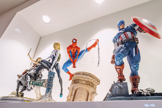 17 January 2023, Dubai, UAE: Captain America, Spiderman and other superheroes on the shelf of comics store