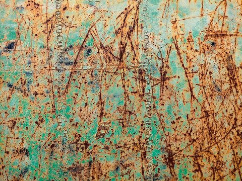 metal surface with old green color full of scratches with rust