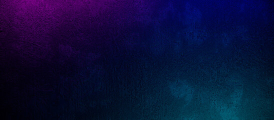 Dark textured concrete wall with laser neon lights. Abstract black grunge background with neon colors.
