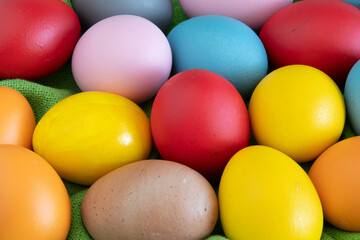 eggs painted in different colors to celebrate Easte