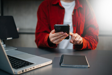 businesswoman hand working with new modern computer using on smartphone and tablet as concept..
