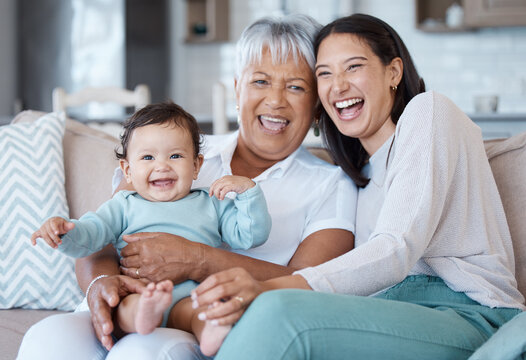 Couldnt be happier. Shot of a mature woman bonding with her granddaughter and daughter on the sofa at home. - Powered by Adobe