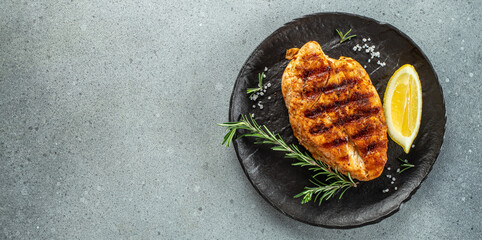 grilled chicken fillet. Healthy fats, clean eating for weight loss. Long banner format. top view