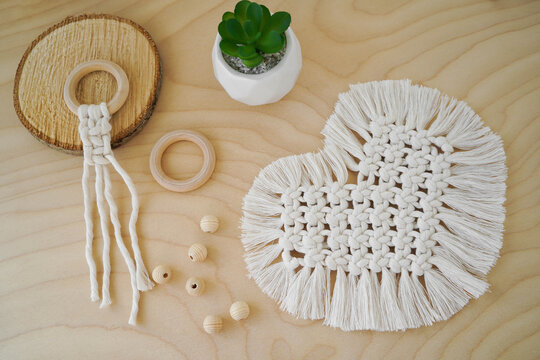 Macrame handmade napkin in the form of heart. Eco diy home decoration. Natural materials, cotton thread. St. Valentine's Day.