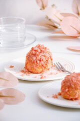 table with pink cakes and drinks