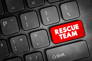 Rescue team text button on keyboard, concept background