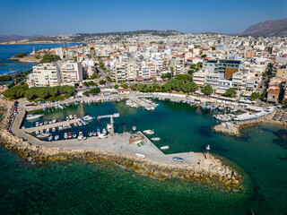 Aerial view of the marina at the bustling tourist resort of Nea Chora in Chania, Crete, Greece