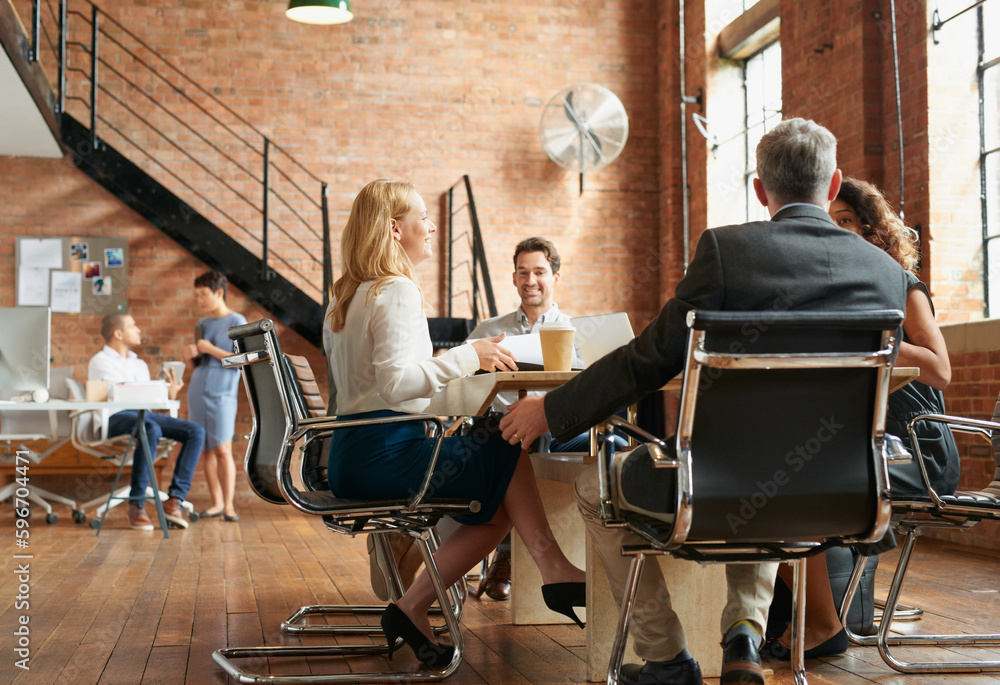Poster wrapping up their meeting with some final thoughts. shot of a group of businesspeople having a meeti