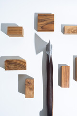 Handmade axe with wooden handle on white background.