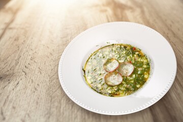 Tasty fresh hot Soup in bowl