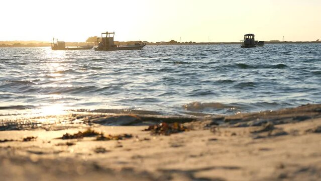 4K Fixed Shot Oyster Boats Moored at Carnac Morbihan Brittany Coast During Sunset Golden Hour
