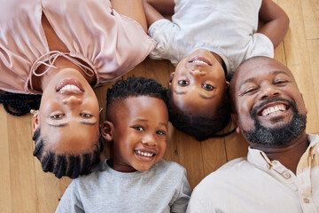 Happy african american family relaxing together and bonding at home. Little brother and sister...