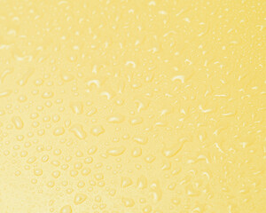 Yellow water drops background texture macro photo