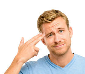 Im so over this. Shot of a handsome young man standing alone in the studio and holding his fingers...