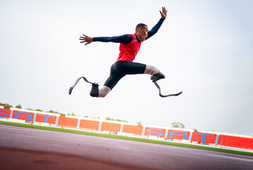 athlete runner physically disabled run on track of stadium