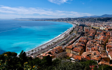 View of the beach and town of Nice, France on the coast of the Mediterranean 
