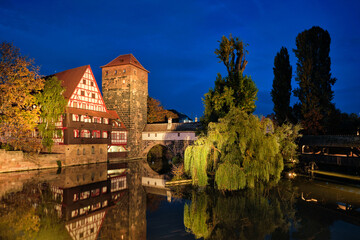 Fototapeta na wymiar Nuremberg city houses on riverside of Pegnitz river. Nuremberg, Franconia, Bavaria, Germany