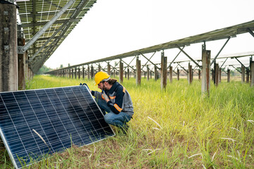 Engineer hand is installing and checking an operation of sun and cleanliness of photovoltaic solar panels, Engineer with energy measurement tool photovoltaic modules for renewable energy