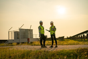 Engineer hand is installing and checking an operation of sun and cleanliness of photovoltaic solar...