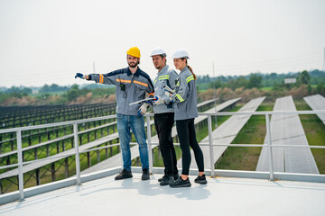 Engineer hand is installing and checking an operation of sun and cleanliness of photovoltaic solar panels, Engineer with energy measurement tool photovoltaic modules for renewable energy