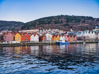 Bryggen colorful wooden buildings, a shot from the sea, Bergen old wharf, Norway