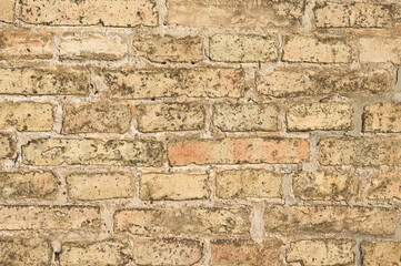 Yellow stone brick wall pattern background