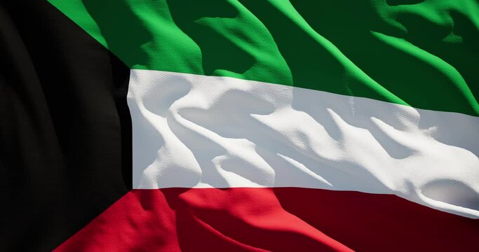 Close-up of the national flag of Kuwait flutters in the wind on a sunny day , 4k slow motion