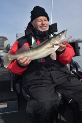 Angler with a walleye