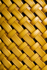 Close up of woven material with yellow and black stripes on it. Generative AI.