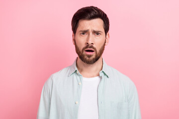 Photo portrait of nice young male sad face disappointed depressed dressed stylish blue garment isolated on pink color background