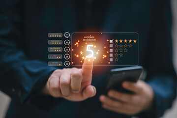 close up Man hand using computer Notebook with popup five star icon for feedback review satisfaction service, Customer service experience and business satisfaction survey.-