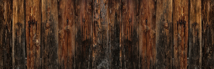 Dark wooden texture. Long wood planks texture background.Wood background and banner. Floor background. Old rustic dark grunge wooden texture.