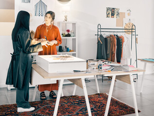 This is my vision. Shot of two young businesswomen talking at work.