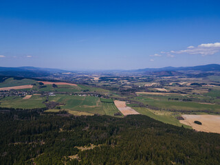 Fototapeta na wymiar A drone view of the Orlicke hory landscape with forest and meadows.. Czech republic.