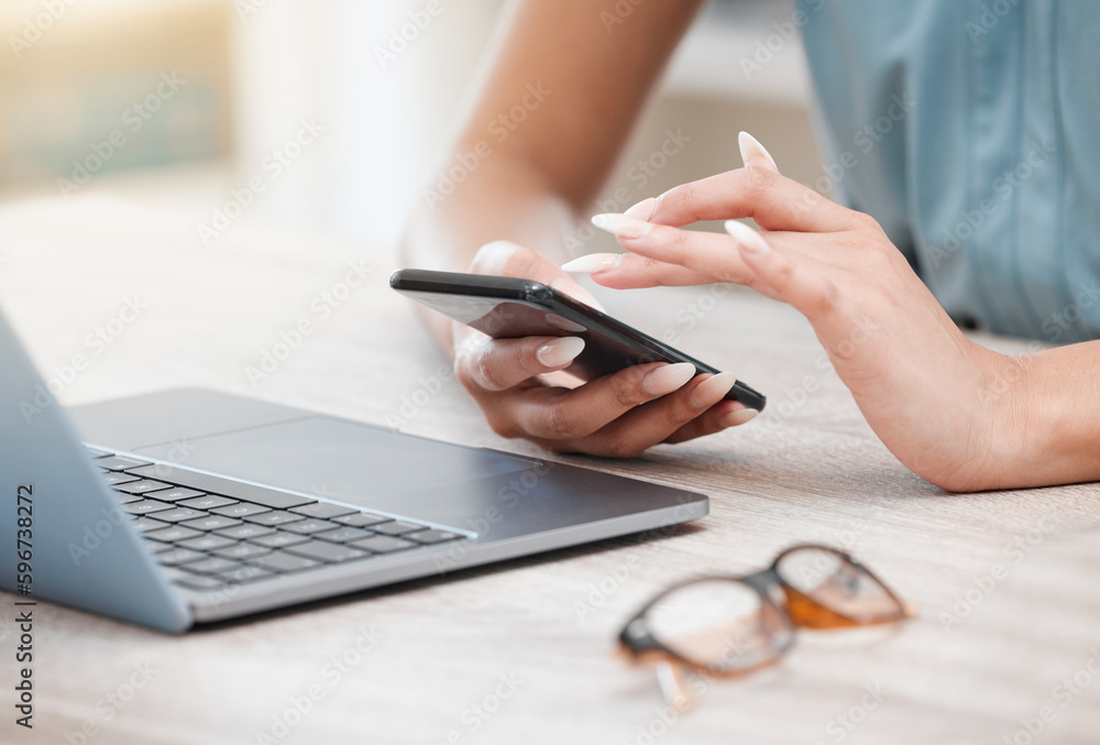 Poster Closeup of females hands using smartphone while sitting at her desk. Business woman sitting by laptop and using mobile phone to send text, chatting on social network or browsing the internet
