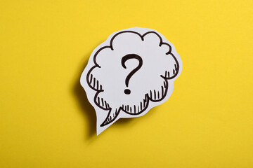 Question mark speech bubble of business concept on yellow background.