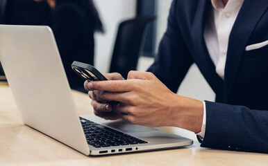 Business people using smart phone or computer for Chat GPT Chat with AI or Artificial Intelligence....