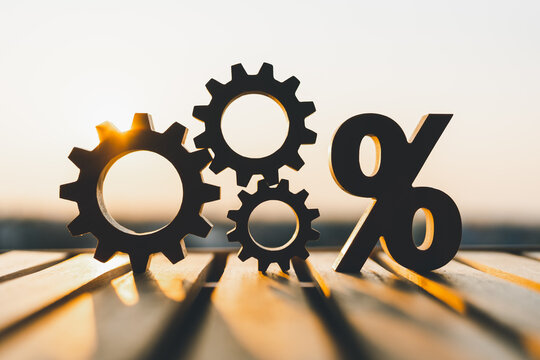 Percentage model and gear model with evening sky Key concepts for success, methods, systems of raising or lowering Fed interest rates to correct inflation concepts.