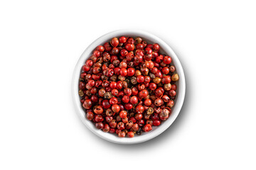 Red pepper seeds bowl. Up view studio shoot on white background